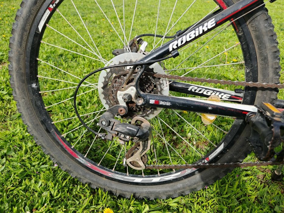 Bicicletă MTB 24", cadru aluminiu, frâne hidraulice pe disc