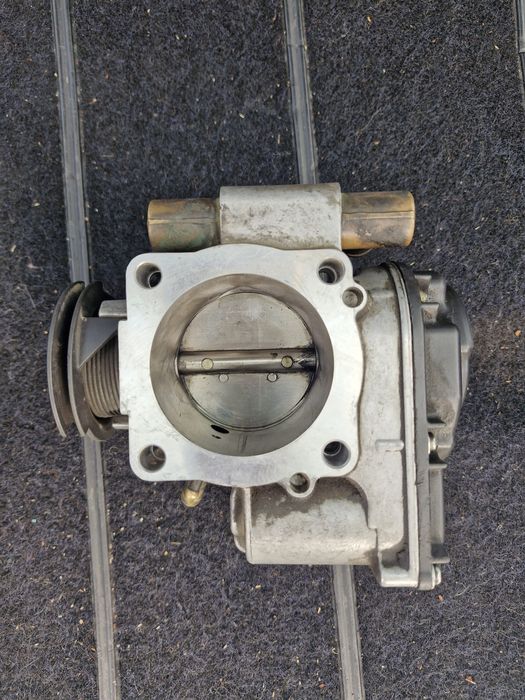 Дроселова клапа за Ауди 1.8 125к.с.