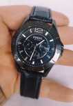 Ceas bărbătesc Fossil CE1003 ceramic, cu quartz si curea din piele.
