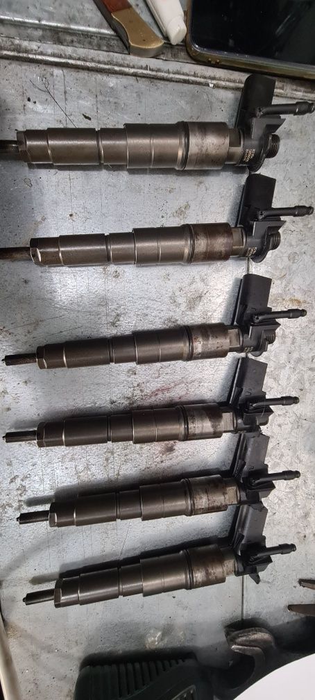 Injectoare injector BMW seria 5,e 60,e61,motor 3.0 diesel