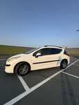 Peugeot 207 SW 1.6 HDI+un set de jante cu cauciucuri de iarna