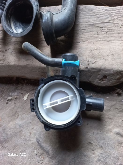 Улитка сливного насоса стиральных машин разные