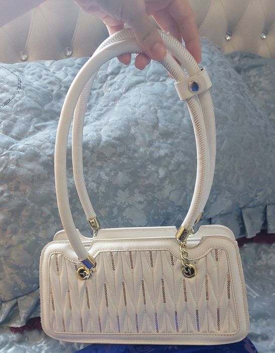 Yangi sumka sarpodagi 1 marta iwlatinilgan