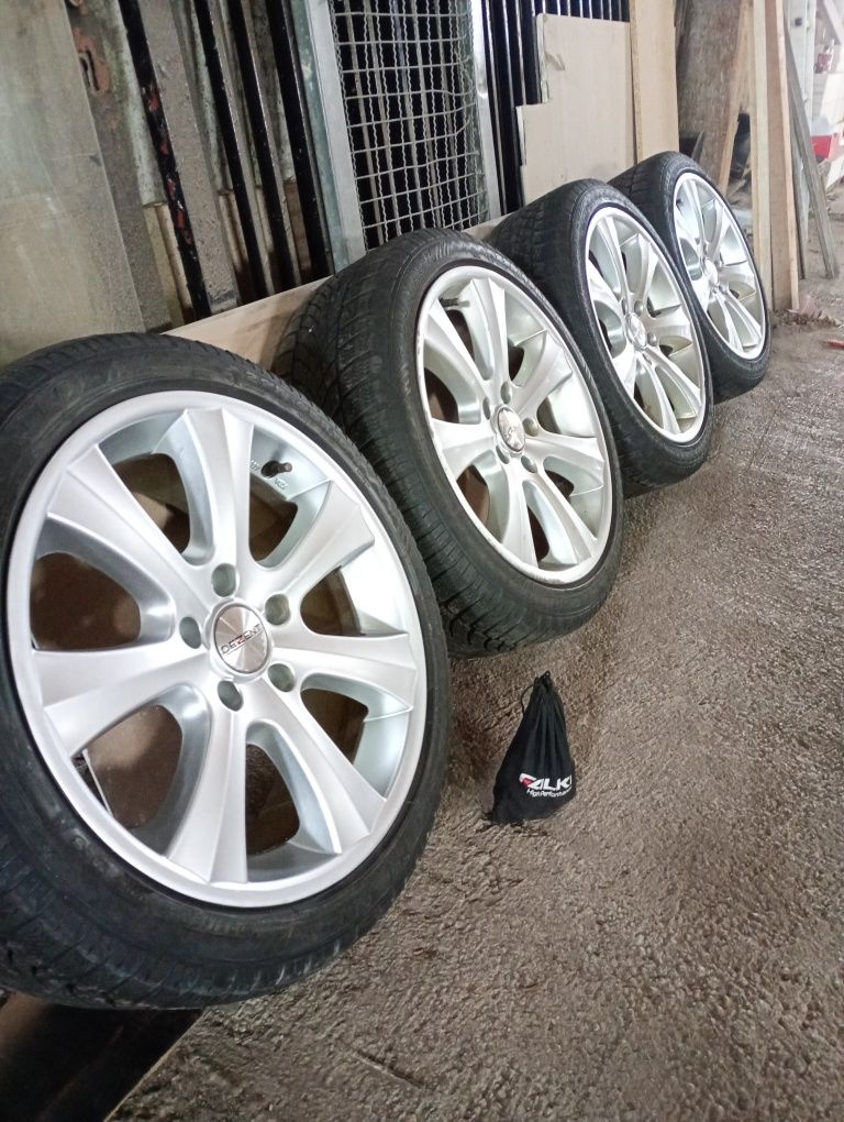 OPEL INSIGNIAджанти със зимни гуми 225/45/18 8J ET35 5x120 цо 67-72