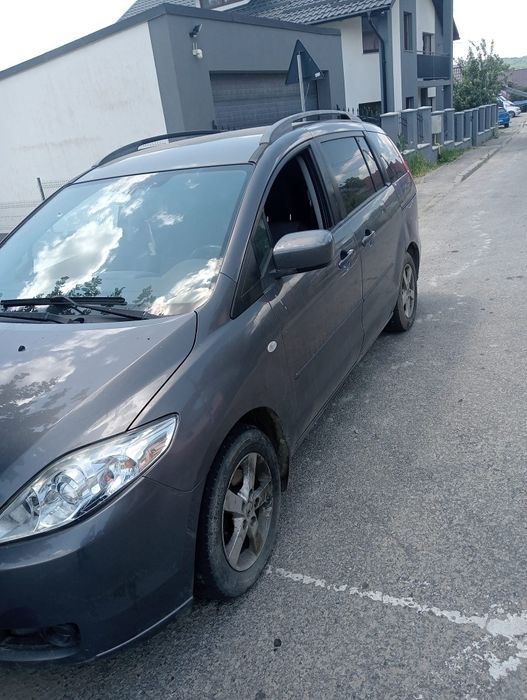 Mazda 5 din 2007 cu 7 locuri motor de 2 litri de 143 cai