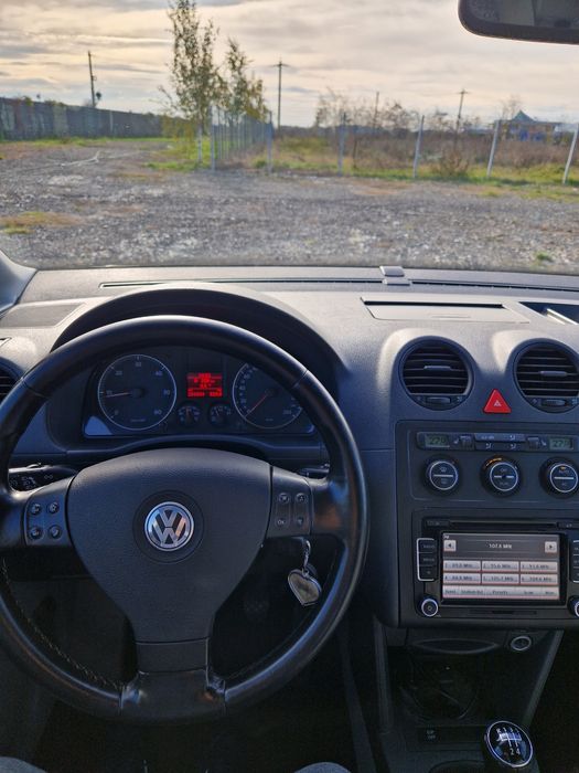 Volkswagen Caddy  7 locului