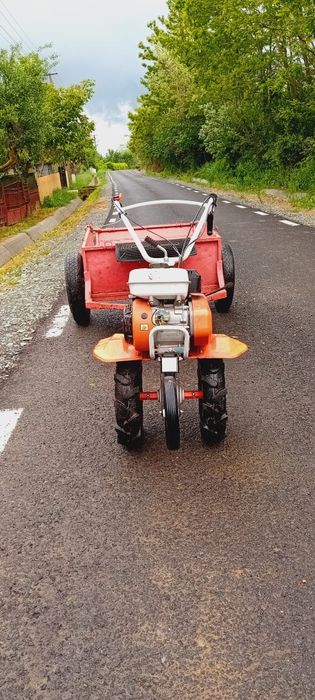 Motocultor cu remorcă și freză aproape nou