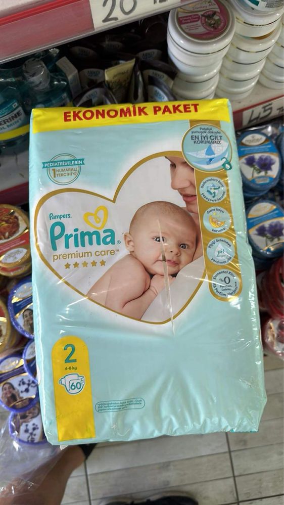 Памперси Prima premium care