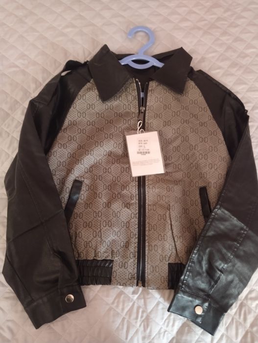 Kurtka yangi kiyilmagan 46 L razmer