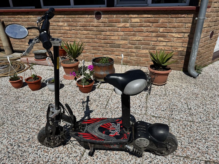 Vand trotineta electrica motr 350 w  tractiune cu lanț