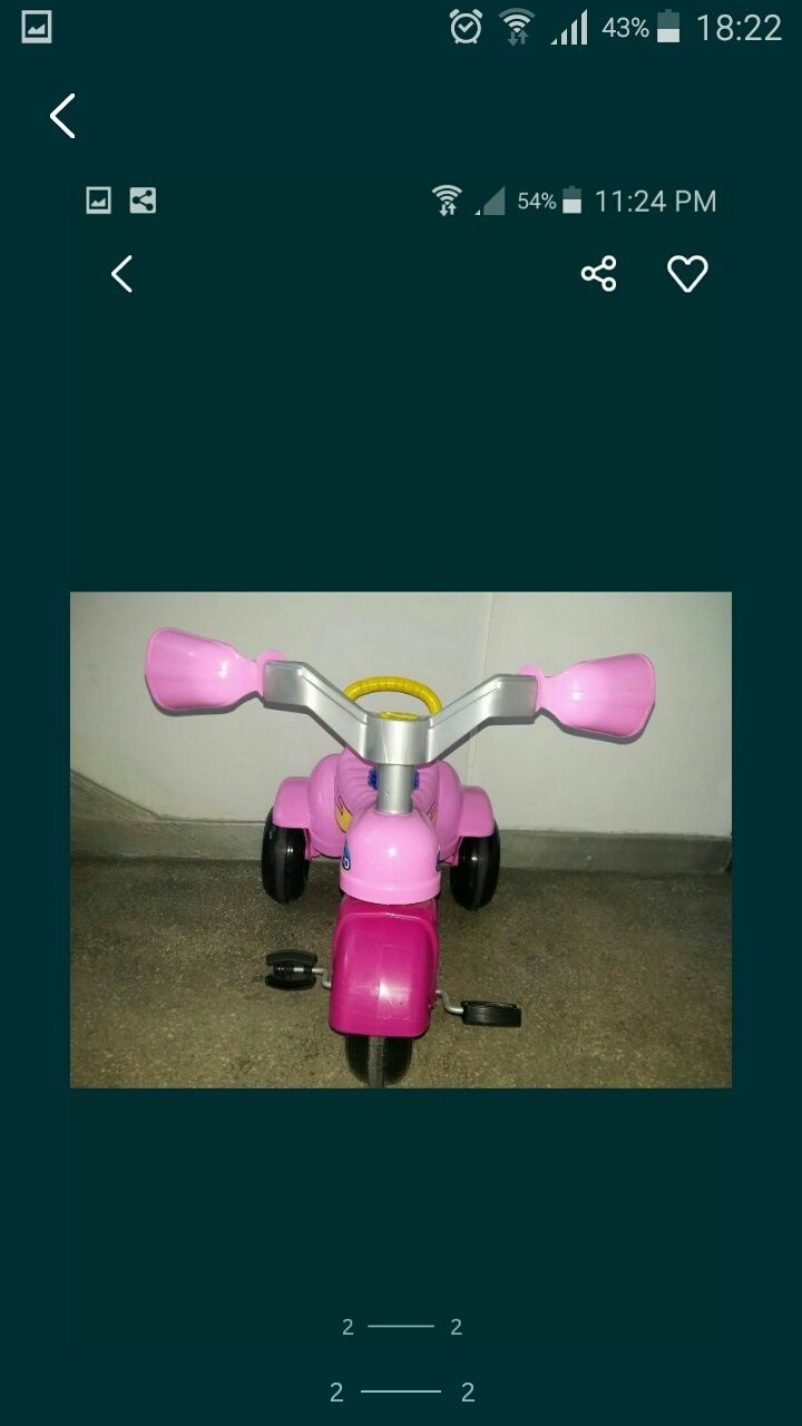 Tricicleta roz .