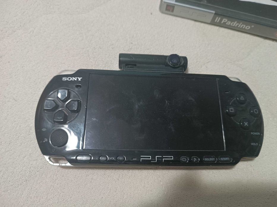 psp + 4gb memory disk + 10 jocuri +camera