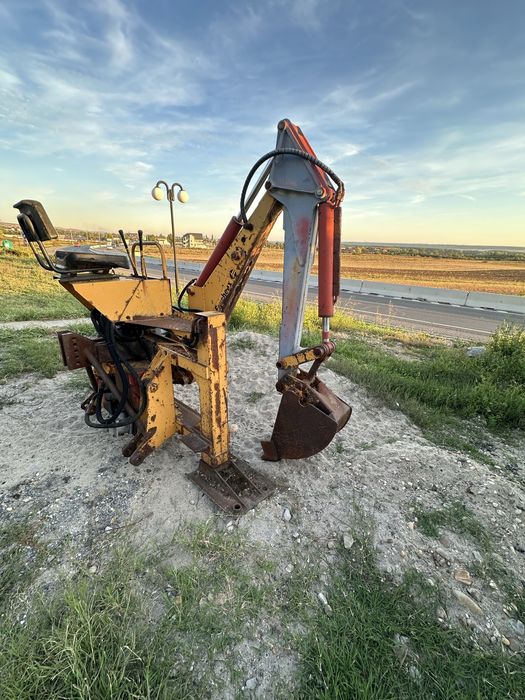 Brat excavator tractor