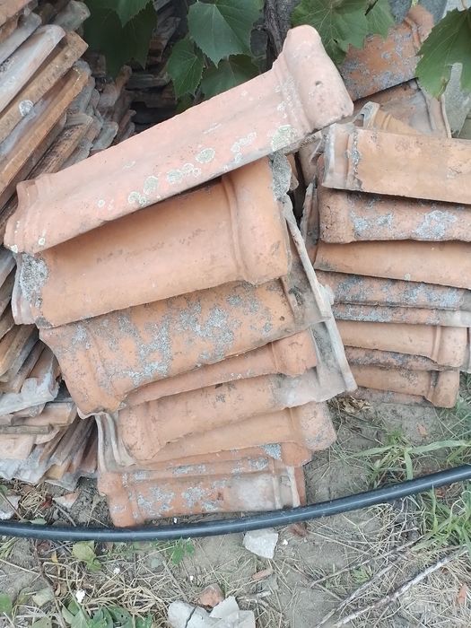 Tigla ,de pus pe casa folosită.
