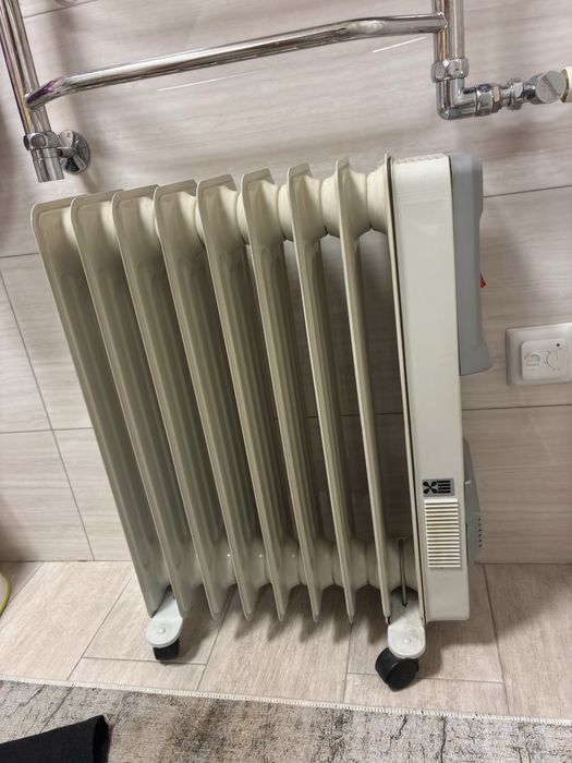 Продам маслянный обогреватель с теплым вентелятором