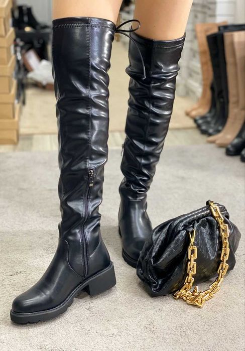 Продам  новые ботфорты.