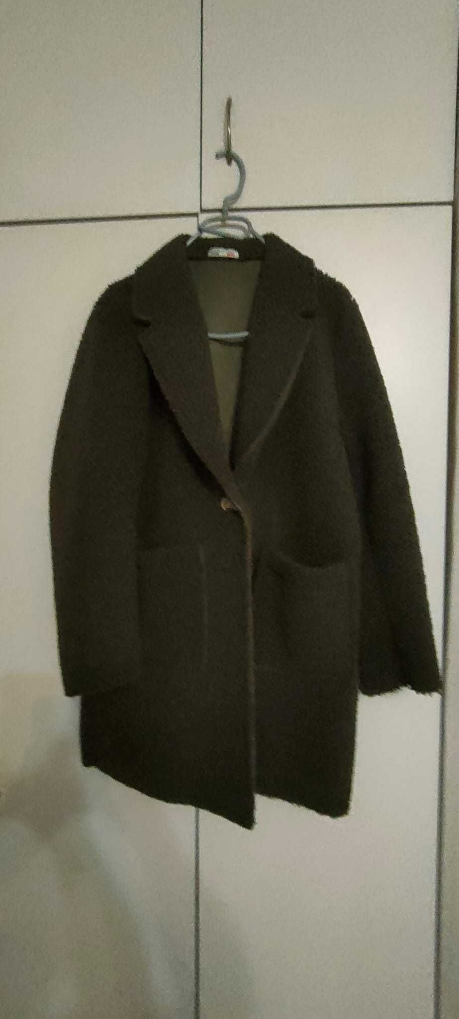 палто произведено в Италия