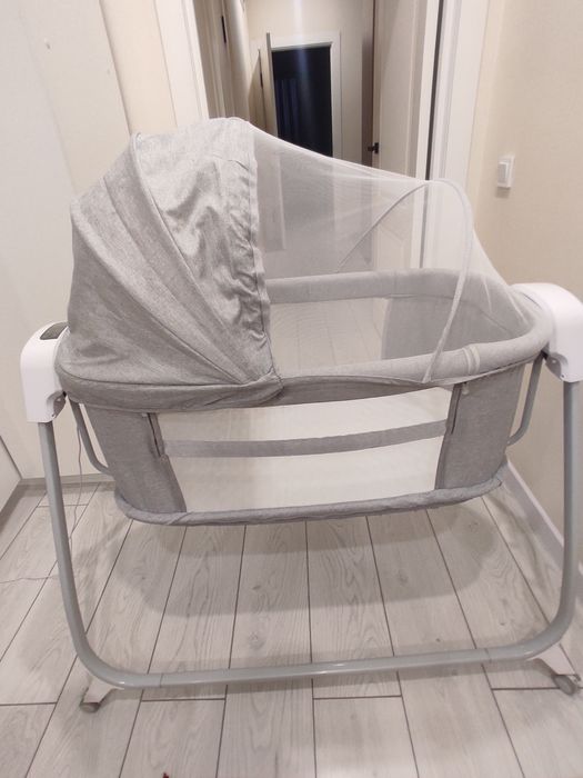 продам электронные детская манеж/кроватка (новая, с коробкой) за 30 00