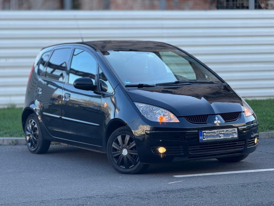 Vând Mitsubishi Colt Diesel, Trapă, Senzori, Interior roșu, economic