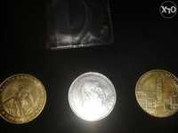 trei monezi de colectie cel alb este de argint astept oferte de pret.