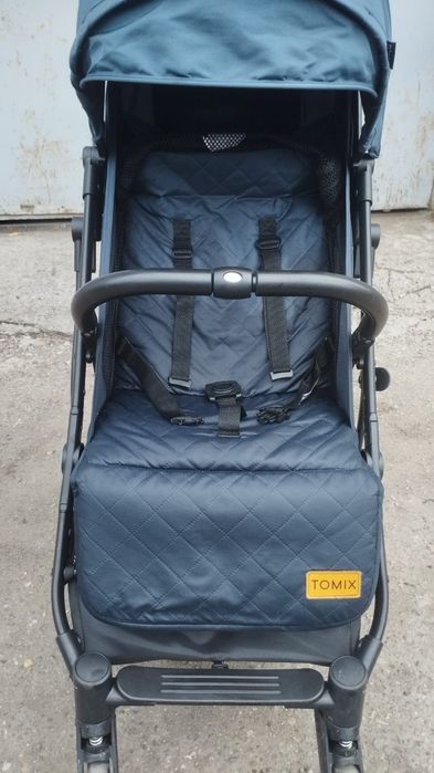 Продам детскую прогулочную коляску TOMIX