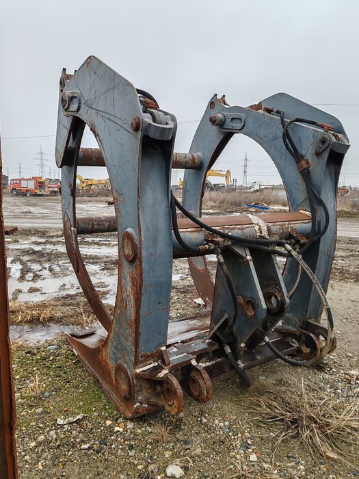 Graifer forestier de pe incarcator frontal Komatsu