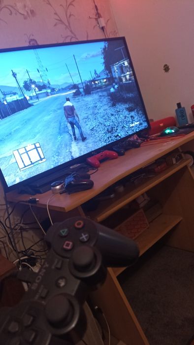 PS3 slim с 2 игри