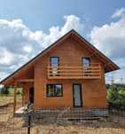 Case de vanzare pe structura de lemn