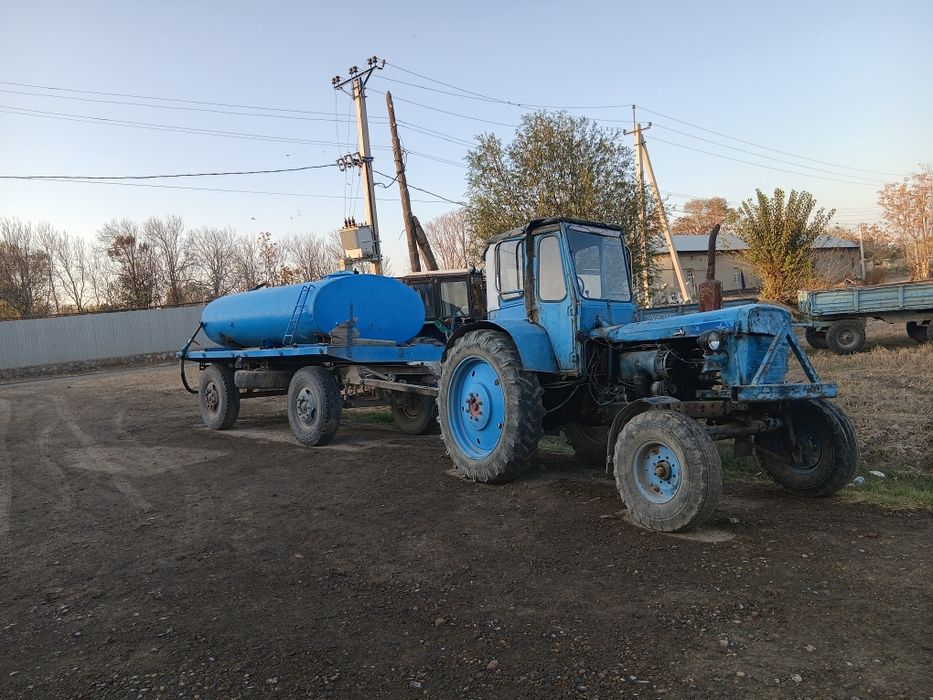 Traktor,suv bochkasi bilan