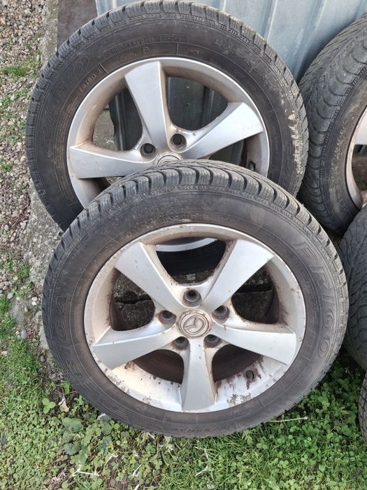 Vand jante aluminiu mazda3 pe 16 cu piulițe si roata rezerva slim .