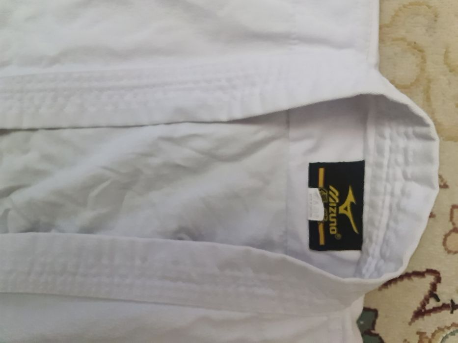 Кимоно для карате б/у на ребёнка 7-8лет