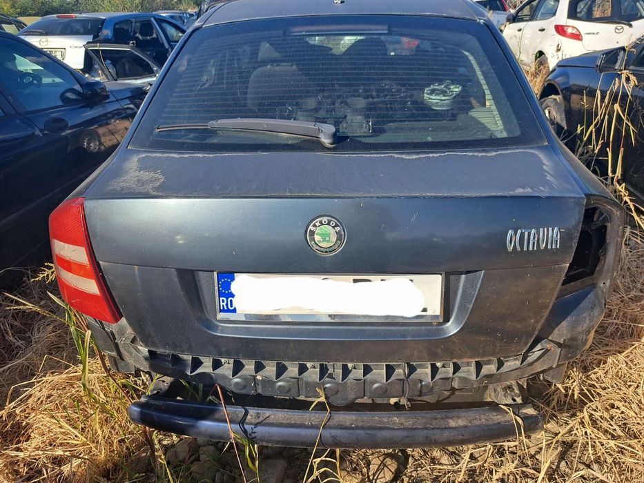 Capota portbagaj Usa stanga dreapta fata spate Oglinda stanga dreapta exterioara Originale Skoda Ocatavia 2 2005-2013 gri
