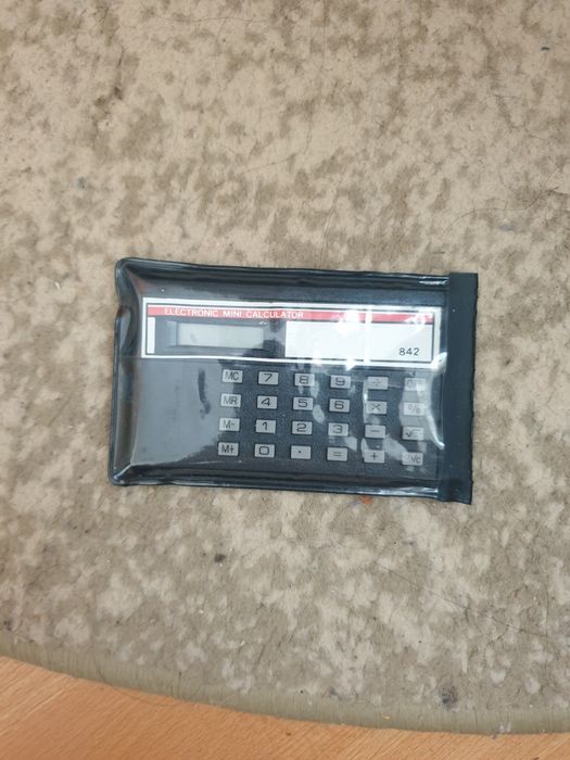mini calculator electronic de epocă