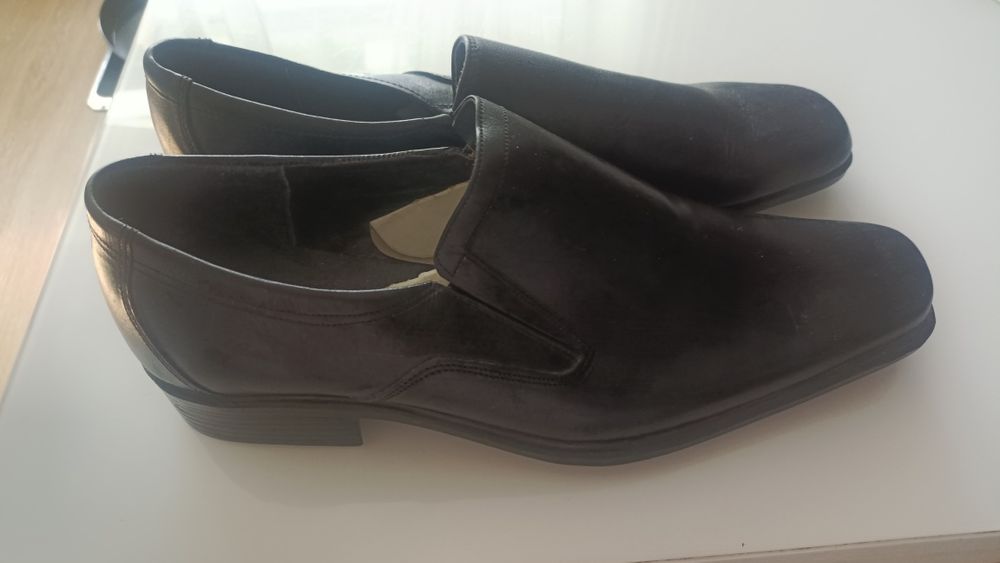 Новые мужские туфли