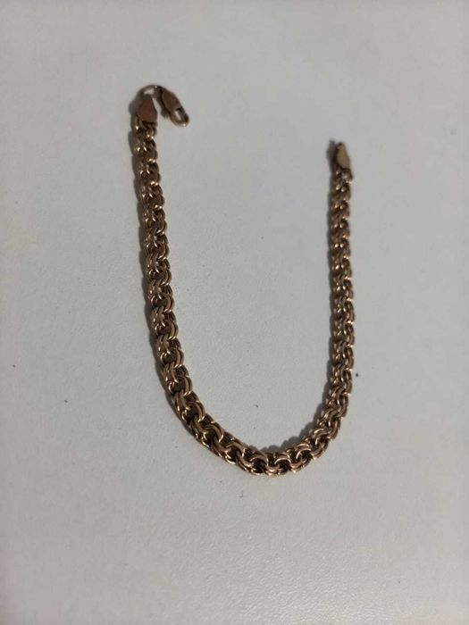 Золотые изделия 40500 за гр (585 проба, цепь, браслеты)