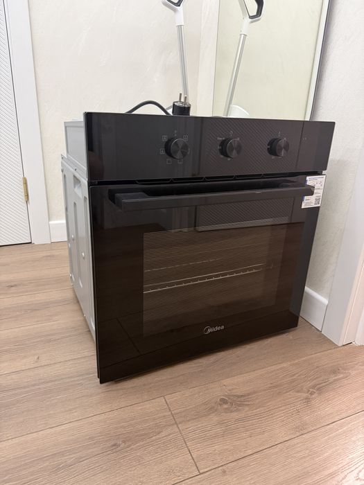 Духовный шкаф Midea