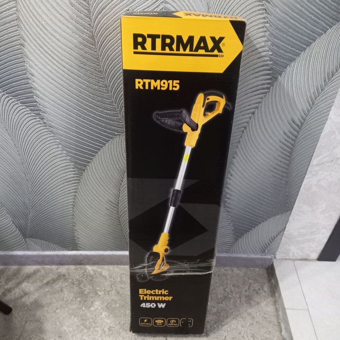 Электрическая газонокосилка