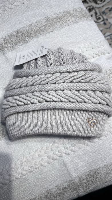 Продам новую зимнюю шапку