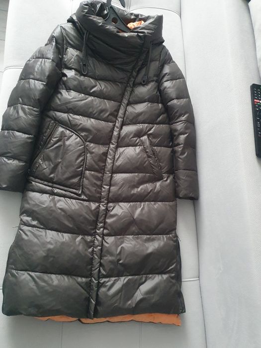 Отдам пуховик б/у в отличном состоянии