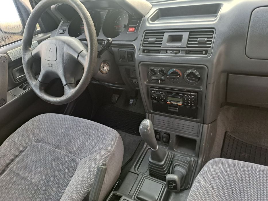 Mitshubishi pajero 2.5 an 2004 clima