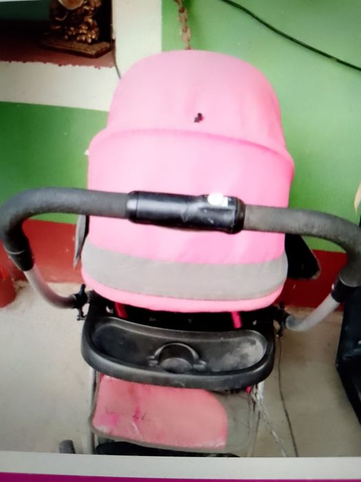 Коляска детская розовая