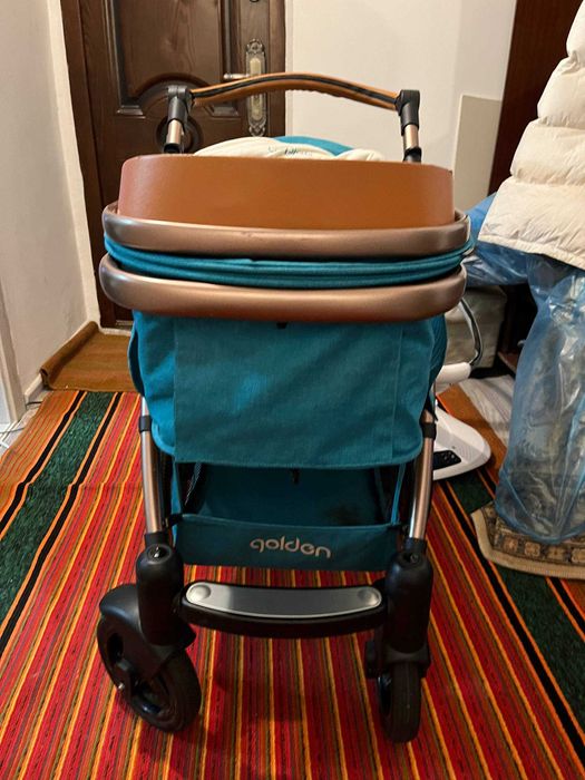 Детская коляска фирмы GOLDEN