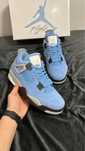 Air Jordan 4 Retro University Blue (size 42)