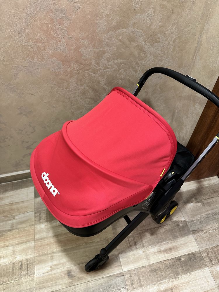 Doona столче за кола с шаси 2 в 1 flame red