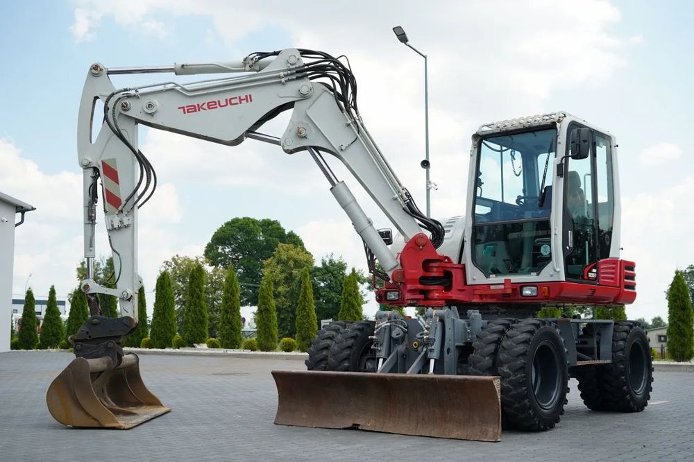Takeuchi TB 295 W / EXCAVATOR PE ROȚI / 2016 / CONTRACT DE SERVICE POST-SERVICE