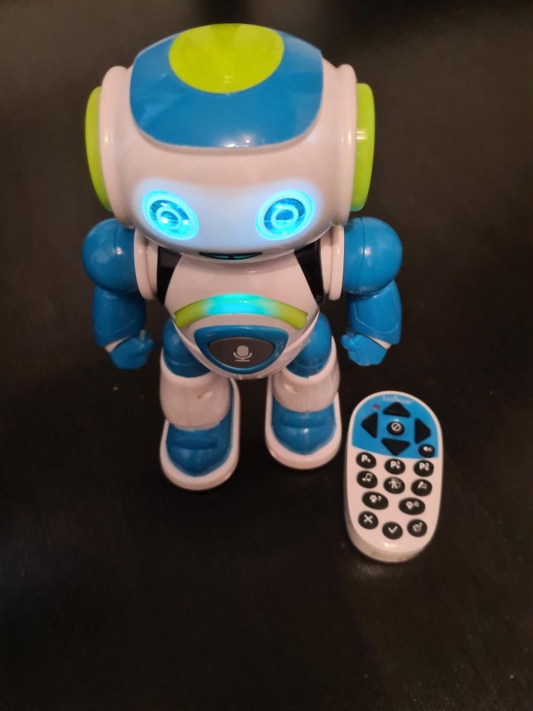 Robot vorbitor, programabil  cu telecomanda.Danseaza, canta reproduce