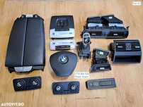 BMW Seria F Cotiera centrala fata Plafoniera fata spate Plafoniera reglabila spate Modul airbag Schimbator viteze Adaptor snap-in bluetooth Grila ventilatie originale BMW F07 F04 F20 F34 F10 F26 F01 F11 F16