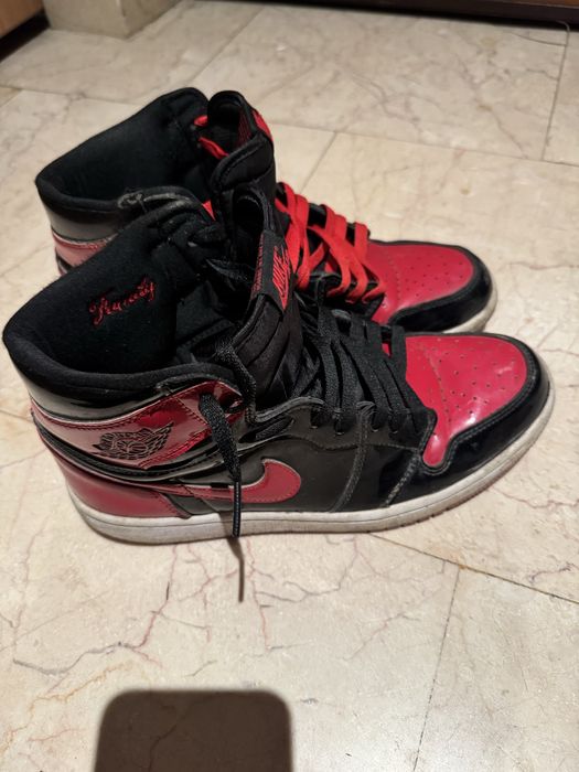 Salut vand sneakers Air Jordan 1 High Patent Bred