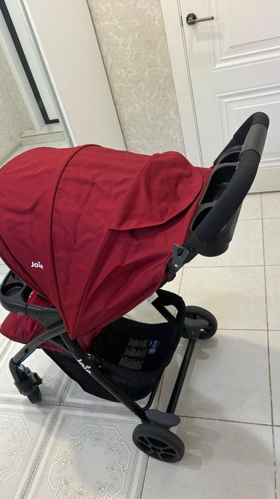 Детская коляска фирмы Джой