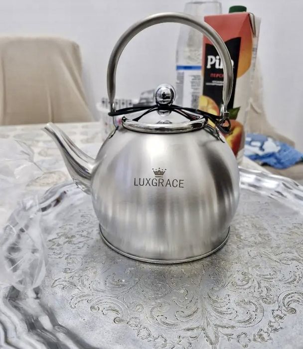 Заварной чайник из нержавеющей стали .